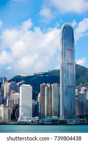 Hong Kong Skyline, Skyscraper Building Cityscape At Victoria Harbor In Sunrise Morning