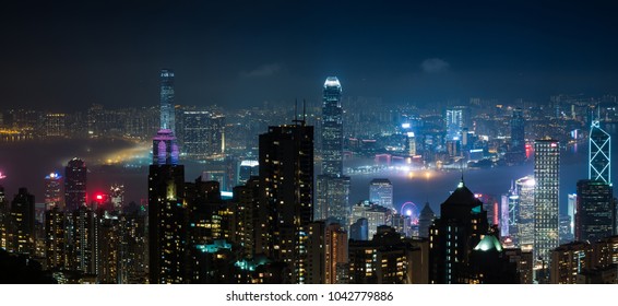 The Hong kong skyline took from Victoria peak when the mist cover some part of city.  - Shutterstock ID 1042779886