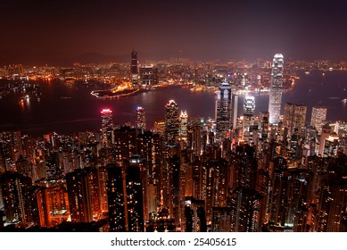 Hong Kong skyline from Victoria Peak, at night. View of the island and Kowloon sides.