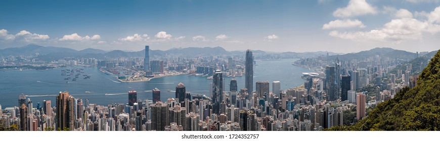 Hong Kong Skyline View From Victoria Peak On A Sunny Day - Hong Kong, China May 4 2020