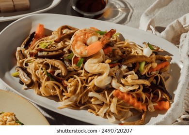 Hong Kong style stir fried noodles are cooked with high heat flames Pad Thai is a popular Thai street food made with fried rice noodles - Powered by Shutterstock