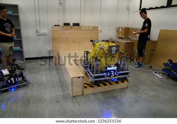 The Hong Kong University of\
Science and Technology,  Clear Water Bay, Sai Kung, Hong Kong - 20\
September 2018: Students testing and doing research on robot\
tank.