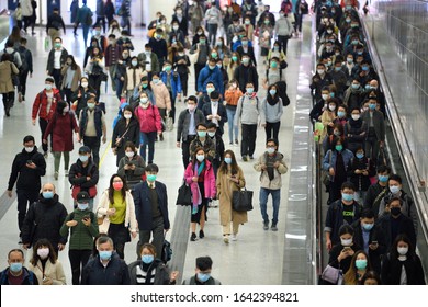 HONG KONG,Central,2020Feb11,government declares Wuhan plague outbreak emergency,citizen in MTR station wearing mask to protect corona virus spread  in air,people live in a fear society & failed state