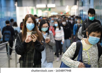 HONG KONG,Central,2020Feb21,government Declares Wuhan Plague Outbreak Emergency,citizen In MTR Station Wearing Mask To Protect Corona Virus Spread  in Air,people Live In A Fear Society & Failed State