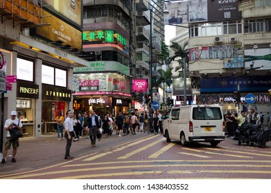 Hong Kong/China - August 1nd 2018 ;
Outside Time Square Hong Kong View Of People In Their Every Day Life. 