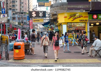 Hong Kong/China, October 23 2015: Crowd Walking On City Road, Hong Kong Ranks 7th On The UN Human Development Index And Has The Seventh-highest Life Expectancy In The World