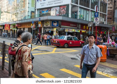 Hong Kong/China, October 23 2015: Crowd Walking On City Road, Hong Kong Ranks 7th On The UN Human Development Index And Has The Seventh-highest Life Expectancy In The World