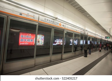 HONGKONG - February 15 2013: Train To Tung Chung And Disneyland Resort Line, Photo At Tsing Yi Railway Station . Tsing Yi Island, Hongkong.