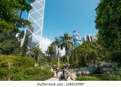 HongKong - November 18, 2019: The Hong Kong Park with lake and skyscrapers buildings in background in HongKong business district