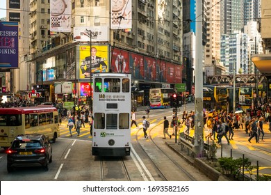 HongKong, November, 2019: Street Traffic Scene,cars, Tram And Pedestrian People Crossing Road  In Hong Kong Causeway Bay