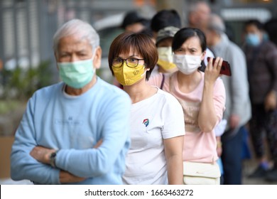 HONGKONG,Jordan,2020Feb29,people Queue In Line in A Free Mask Giving Event By JunCulture.Under Wuhan Plague Outbreak Emergency,wearing Mask For Protection Of Corona Virus Spread In The fear Society