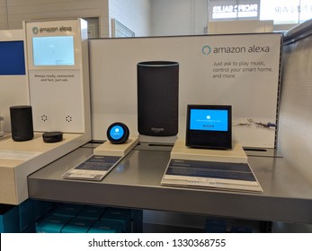 Honolulu -  August 10 2018: Echo Dot (2nd Generation), Dot, Show - Smart Speaker With Alexa - Black On Display. Similarly To Other Devices In The Family, It Is Designed Around Amazon's Virtual