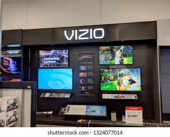 Honolulu -  August 10 2018:  Vizio TV Display With Dog Shaking Inside Best Buy.  VIZIO Is The Maker Of The Top-selling 4K HDR TVs And America's #1 Sound Bar Brand. 