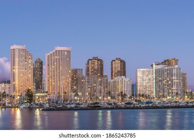 Honolulu city skyline reflection in ocean, Hawaii, United States