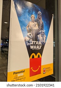 Honolulu - December 17, 2019:  Star Wars The Rise Of Skywalker Movie Poster Ad Featuring The C-3PO, R2D2, BB8, D-O Droid And Chewbacca In Window Of Mcdonalds.