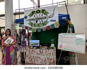 Honolulu - February 10, 2018: Woman Smiles At Potluck With Smooch Booth At The 3rd Annual Hawaii Cannabis Expo Inside The Neal S Blaisdell Exhibition Hall, Honolulu, Hawaii. 