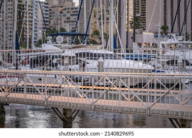 Honolulu, Hawaii - circa February 2022: Pedestrian bridge at the harbor at Ala Moana.