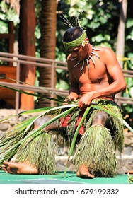 Honolulu, Hawaii - May 27, 2016:A Young Samoan Man Demonstrating The Art Of Weaving In The Village Of Samoa At The Polynesian Cultural Center.