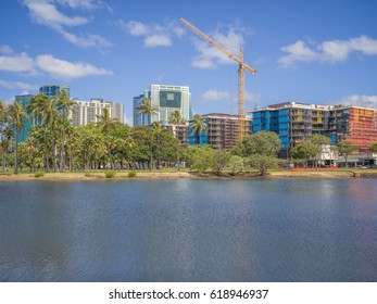 Honolulu, Hawaii, USA, April 11, 2017:  Ala Moana Regional Park Panorama of the Lagoon with the expanding Ala Moana Center in the backdrop.