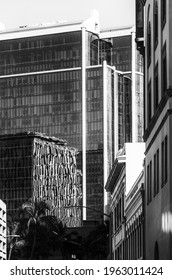 Honolulu, Hawaii, USA.  April 26, 2021.  Downtown Honolulu Business District Reflections On The Glass Exterior Walls On A Sunny Morning.