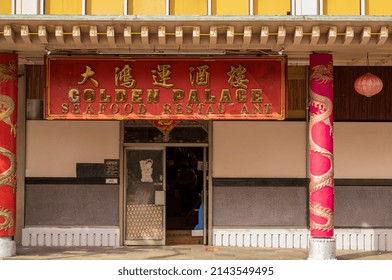 Honolulu, Hawaii, USA.  April 7,  2022.   Asian Restaurant And Bar With Red And Gold Exterior.