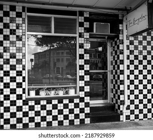 Honolulu, Hawaii, USA.  August 8, 2022.  Small Business Featuring A Black And White Tiled Front Entrance.