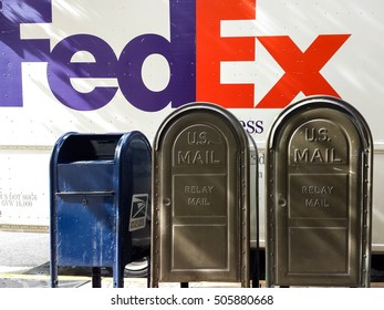 Honolulu, Hawaii, USA - Dec 18, 2015: FedEx Truck And US Mail Postal Boxes On The Side Of A Road.