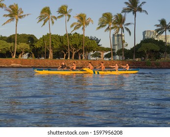 Honolulu, Hawaii, USA.  Dec. 25, 2019.  Christmas Day Outrigger Canoe Races in Waikiki with the Punahou School in the lead.