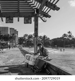 Honolulu, Hawaii, USA.  December 28, 2021.  Street Musician Playing Steel Drum Music For Tourists 