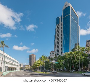 Honolulu, Hawaii, USA, Feb. 14, 2017:  Honolulu Chinatown Gateway and Ala Moana Blvd., with a tropical blue spring sky above.