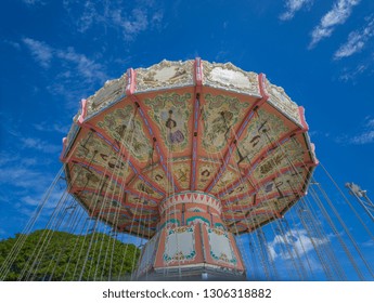 Honolulu, Hawaii, USA.  Feb. 7, 2019.  Upward View Of A Merry Go Round Ride With Blue Skies Above.