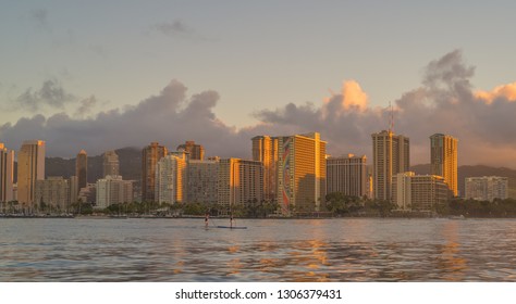 Honolulu, Hawaii, USA.  Feb. 7, 2019.  Women Athletes on stand up paddle boards offshore in Waikiki.