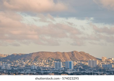 Honolulu, Hawaii, USA, Feb. 7, 2017:  Late Afternoon Panorama Of Punch Bowl Crater With Pink Clouds Above.