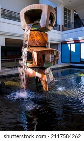 Honolulu, Hawaii, USA.  February 3, 2022.  Waterfall at Ala Moana Center in Waikiki with recycled water flowing from a welded copper structure.