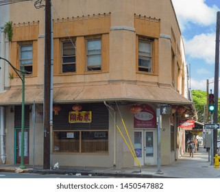 Honolulu, Hawaii, USA.  July 14, 2019.  Urban Decay In A Colorful Century Old Building In Central District.