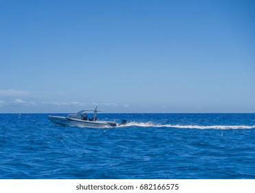 Honolulu, Hawaii, USA, July 22, 2017:  High Speed Outboard Powered Boat Racing Through The Offshore Waters Of Waikiki.