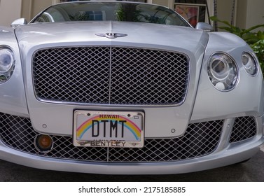 Honolulu, Hawaii, USA.  July 5, 2022.    Front Profile Of A Silver Ultra Luxury Car In Waikiki.