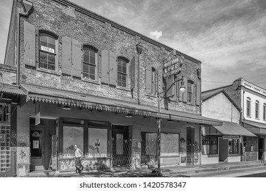 Honolulu, Hawaii, USA.  June 10, 2019.  Urban Decay In Honolulu Chinatown As An Elderly Resident Walk The Deserted Streets.