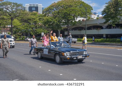 Honolulu, Hawaii, USA, June 14, 2016:  Governor David Ige And Wife Dawn Ige, Riding In The 100th Annual Kamehameha Day Parade.