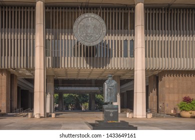 Honolulu, Hawaii, USA.  June 25, 2019.  Open courtyard of the Hawaii State Legislature with the Seal of Hawaii above the ground.