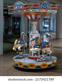 Honolulu, Hawaii, USA.  June 30,   2022.  Closed Shopping Center And An Empty Children's Ride Symbolizing The Affect Of The Covid Virus On Young Children.