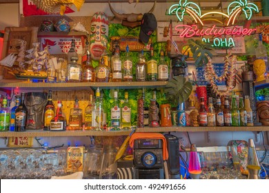 Honolulu, Hawaii, USA, October, 3, 2016:  Closeup View Of The New Tiki Bar At The Hawaii Yacht Club With Colorful Memorabilia In The Backdrop.