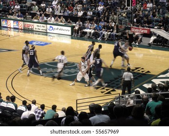 HONOLULU, HI - FEBRUARY 27: Nevada 63 Vs. Hawaii 74:UH Player Drives To The Basket As His Teammate Runs A Screen February 27, 2010 At The Stan Sheriff Center In Honolulu, Hawaii.