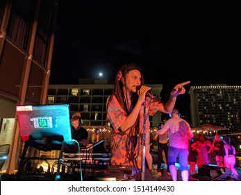 Honolulu, HI - January 4, 2019: DJ Jerome James And Full Moon At Silent Disco On Rooftop Deck.