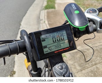 Honolulu - July 24, 2019: Bike Handle Bar With Rad Power Bikes Display Screen, Lock, And Light.   The LCD Display Information Categories.  A Seattle Ebike Company, Rad Power Bikes Is A Consumer Direct