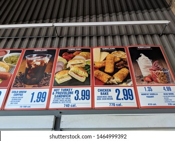 Honolulu - July 3, 2018: Costco Food Court Menu featuring Cold Brew Coffee, Hot Turkey and Provolone Sandwich, Chicken Bake, Yogart, and Acai Bowl.