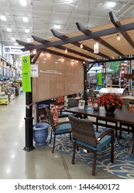 Honolulu - June 20, 2017: Outdoor Furniture Including Chairs, Table, Flowers , And Gazebo For Sale Inside Lowe's Home Improvement Store.