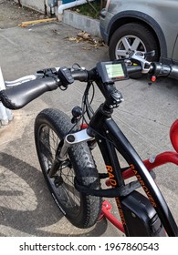 Honolulu - March 21, 2018: Rad Power Bikes Parked On Red Bike Rack.  A Seattle Ebike Company, Rad Power Bikes Is A Consumer Direct Ebike Company Making The RadRover Electric Fat Bike.