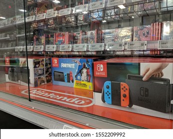 Honolulu -  October 30, 2018:  Nintendo Switch And Games Like Fortnite, Just Dance, Kirby, FIFA On Display At Best Buy. Nintendo Switch Is Designed To Go Wherever You Do, Transforming From Home.