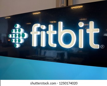 Honolulu - September 7, 2018: Fitbit Logo on wall in Honolulu Best Buy store. Fitbit, Inc. is an American company headquartered in San Francisco, California. Its products are activity trackers.